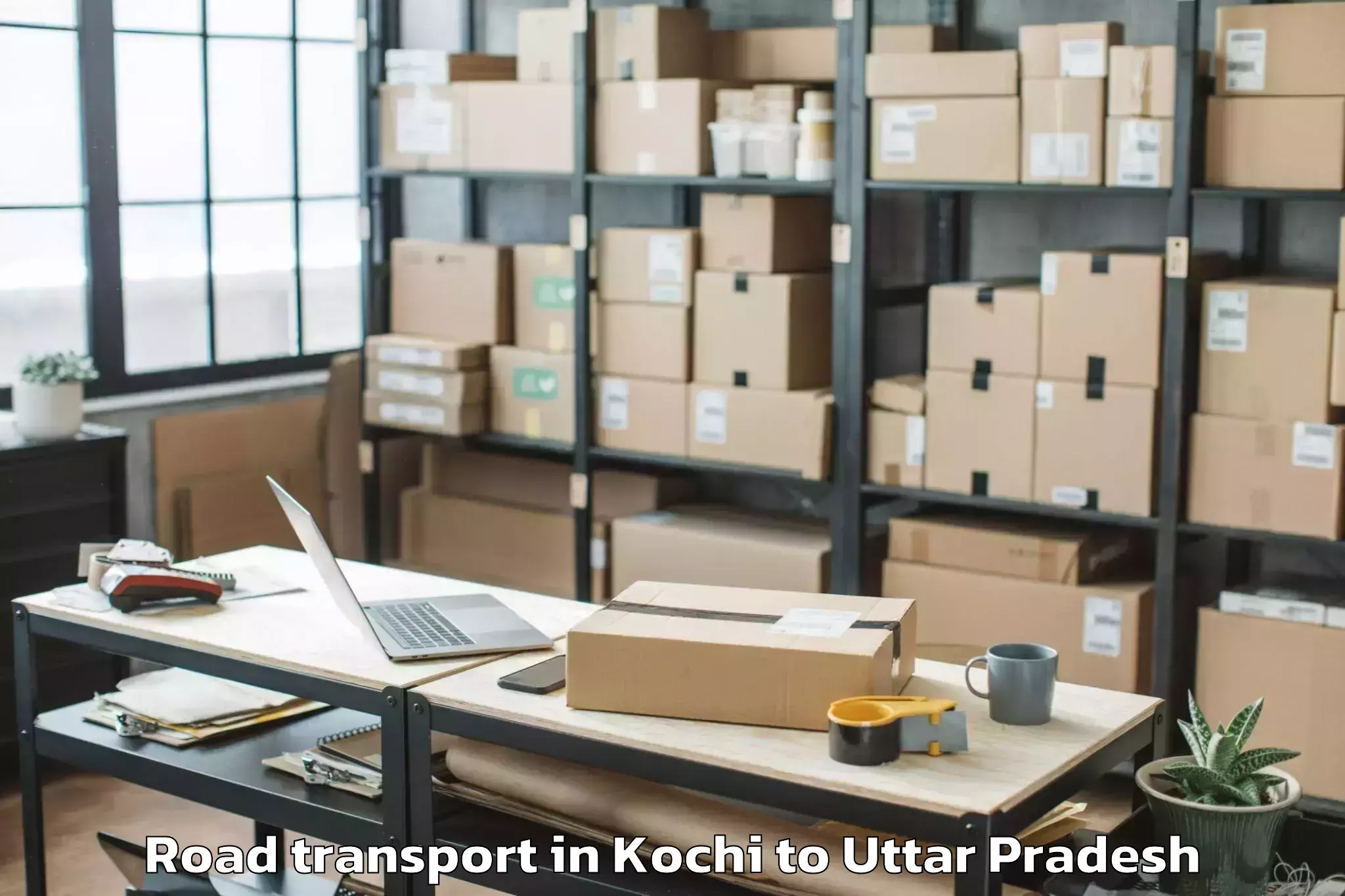 Book Kochi to Chandra Shekhar Azad Universit Road Transport